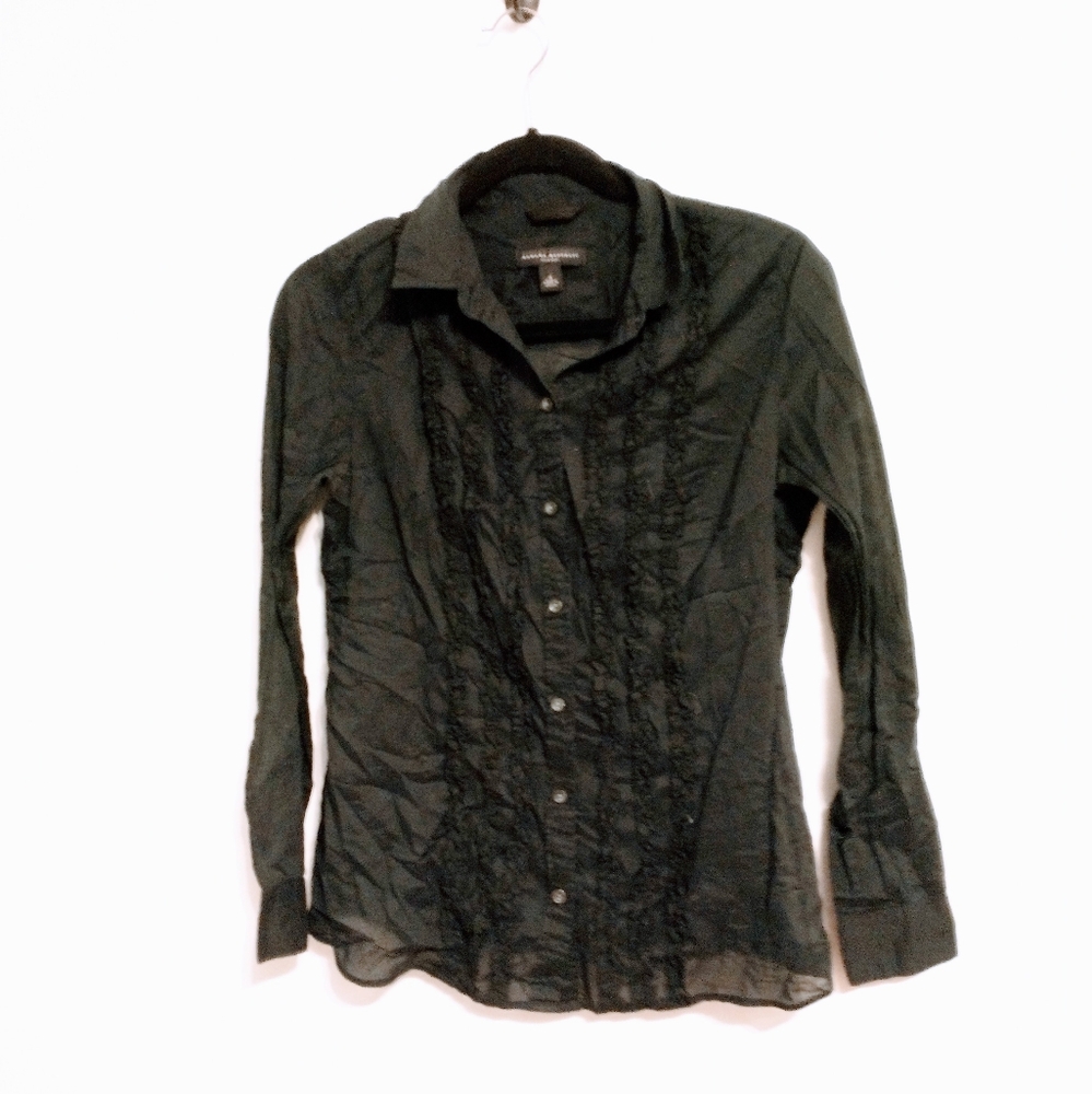 Banana Republic black button up 100% cotton top with ruffles along the buttons.